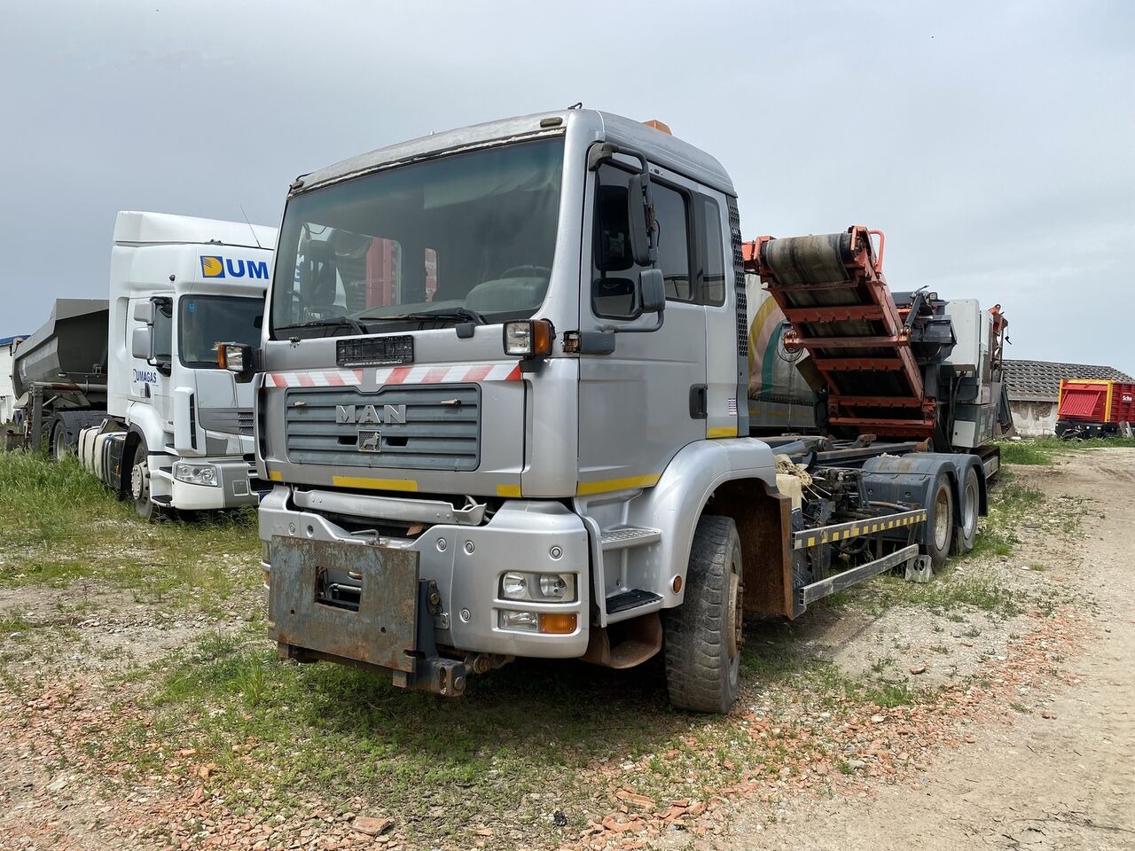 Locação de MAN TGA 6x4 Euro 3 AbrollKipper MAN TGA 6x4 Euro 3 AbrollKipper: foto 12 Locação de MAN TGA 6x4 Euro 3 AbrollKipper MAN TGA 6x4 Euro 3 AbrollKipper: foto 12