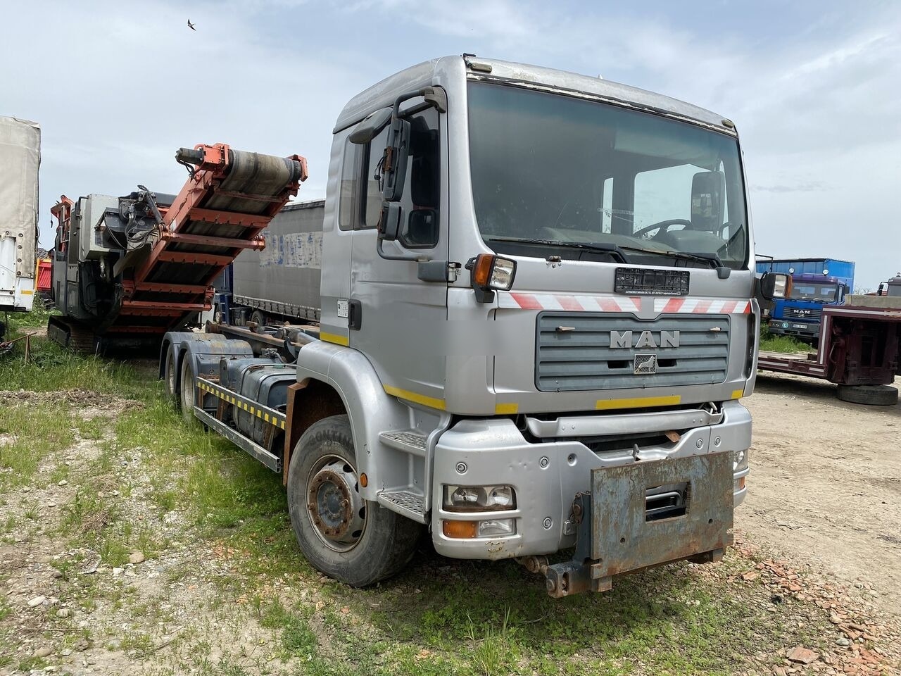 Locação de MAN TGA 6x4 Euro 3 AbrollKipper MAN TGA 6x4 Euro 3 AbrollKipper: foto 13 Locação de MAN TGA 6x4 Euro 3 AbrollKipper MAN TGA 6x4 Euro 3 AbrollKipper: foto 13