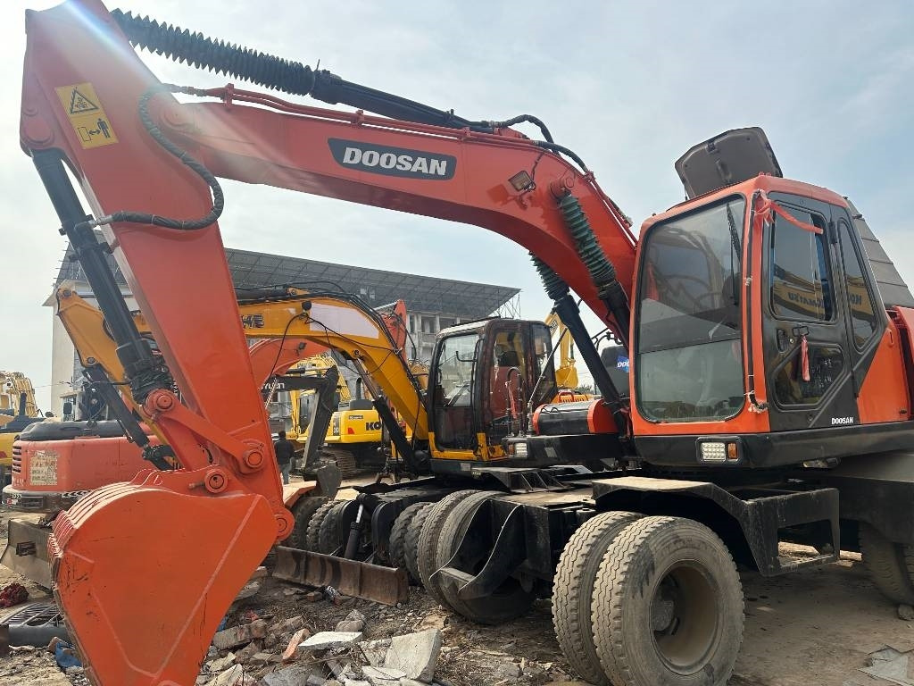 Doosan DX 150W -9 - Escavadeira de rodas: foto 5 Doosan DX 150W -9 - Escavadeira de rodas: foto 5