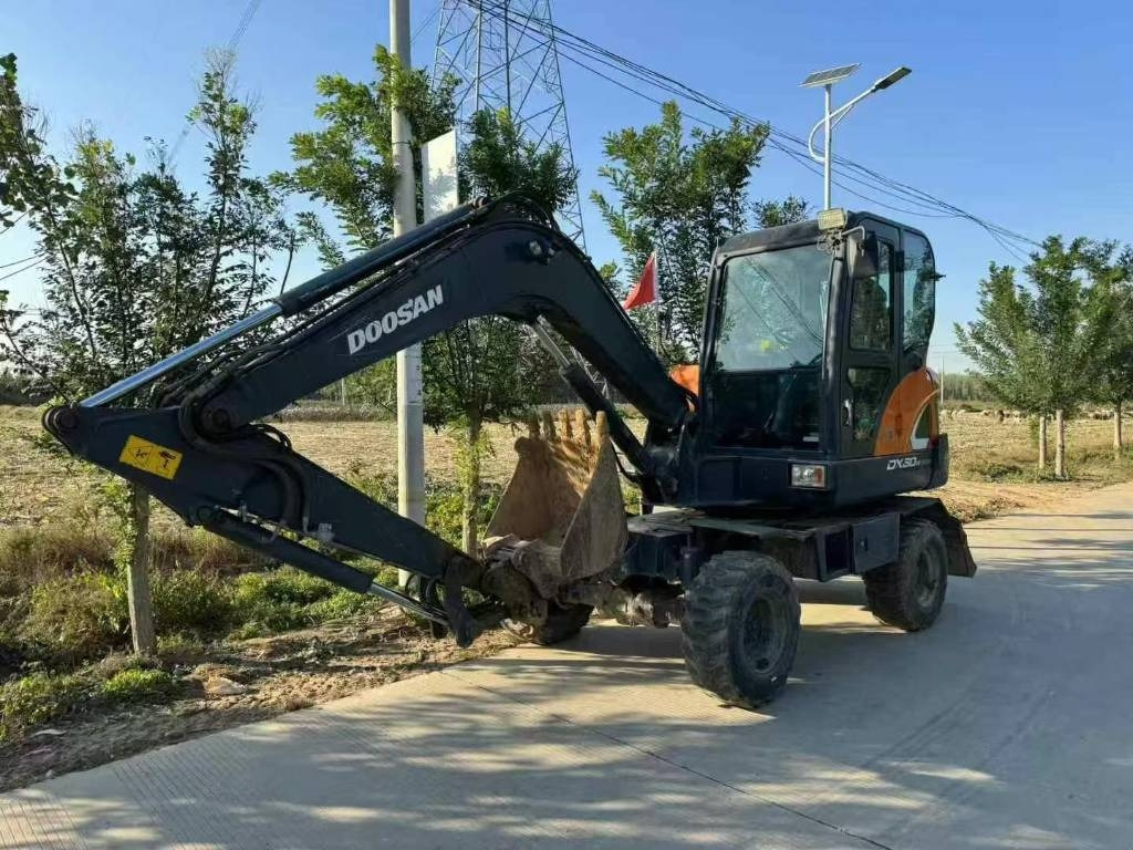 Doosan DX 60 - Mini escavadeira: foto 1 Doosan DX 60 - Mini escavadeira: foto 1