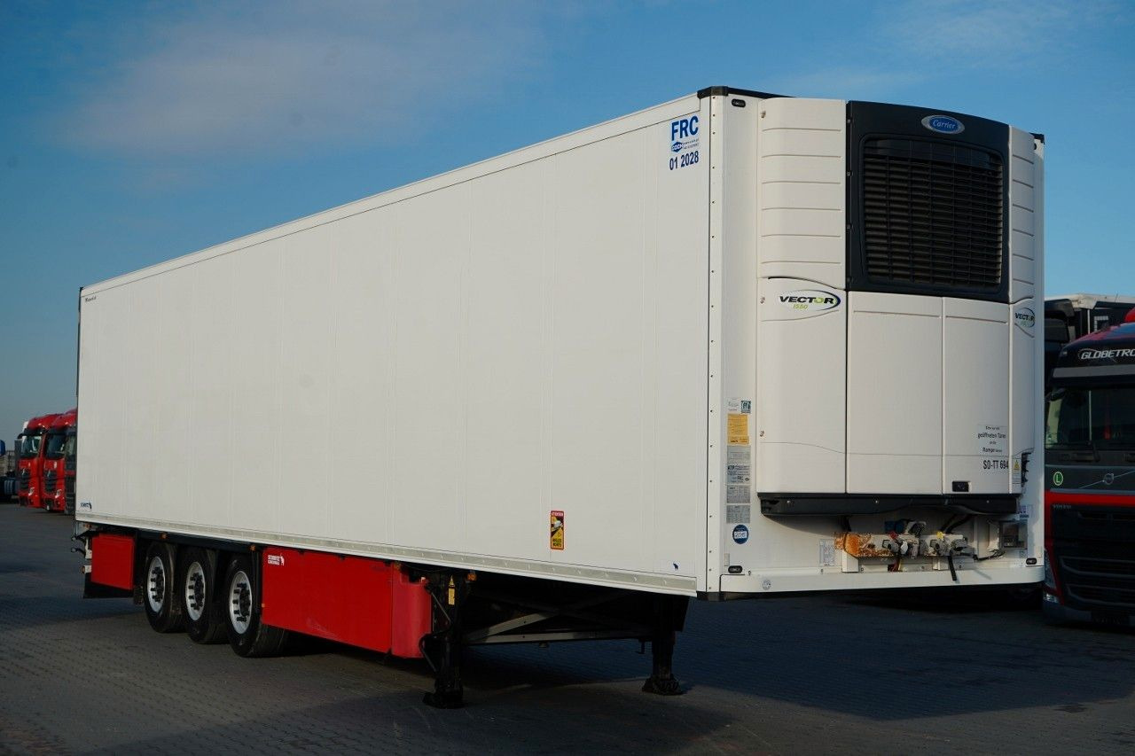 Schmitz Cargobull CHŁODNIA / CARRIER VECTOR 1550 / OŚ PODNOSZONA / - Semireboque frigorífico: foto 1 Schmitz Cargobull CHŁODNIA / CARRIER VECTOR 1550 / OŚ PODNOSZONA / - Semireboque frigorífico: foto 1