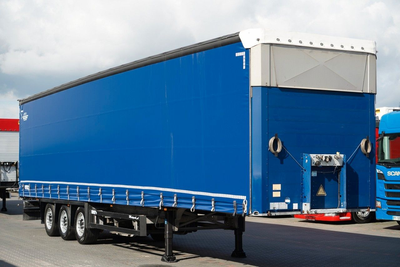 Schmitz Cargobull FIRANKA VARIOS / PODNOSZONY DACH / OPONY 385/55 - Semi-reboque de lona: foto 1 Schmitz Cargobull FIRANKA VARIOS / PODNOSZONY DACH / OPONY 385/55 - Semi-reboque de lona: foto 1