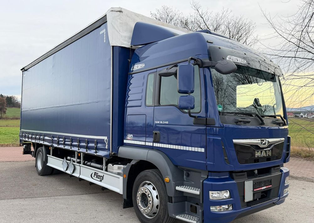 MAN TGM 18.340 / FIRANKA / LIFT / SPROWADZONY / KLIMA POSTOJOWA / 2017 / 9700 ŁADOWNOŚĆ / AUTOMAT / 18 PALET / E6 / WINDA / - Caminhão com lona: foto 1 MAN TGM 18.340 / FIRANKA / LIFT / SPROWADZONY / KLIMA POSTOJOWA / 2017 / 9700 ŁADOWNOŚĆ / AUTOMAT / 18 PALET / E6 / WINDA / - Caminhão com lona: foto 1
