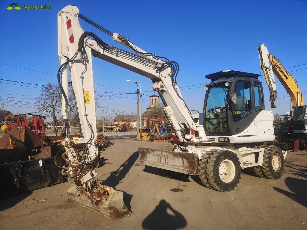 Case WX 125 - Escavadeira de rodas: foto 1 Case WX 125 - Escavadeira de rodas: foto 1