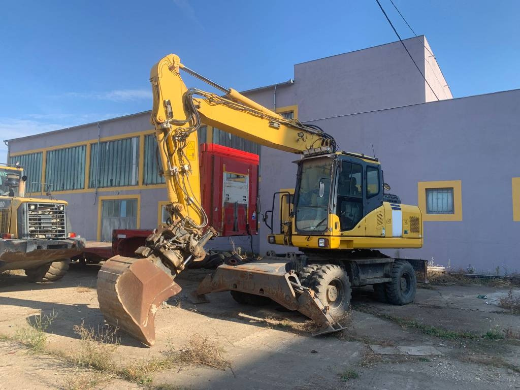 Komatsu PW180-E0+Engcon Rototilt - Escavadeira de rodas: foto 1 Komatsu PW180-E0+Engcon Rototilt - Escavadeira de rodas: foto 1