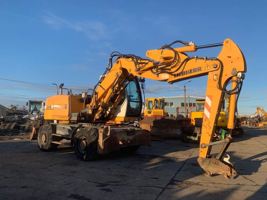 Liebherr A 314 Litronic - Escavadeira de rodas: foto 5 Liebherr A 314 Litronic - Escavadeira de rodas: foto 5