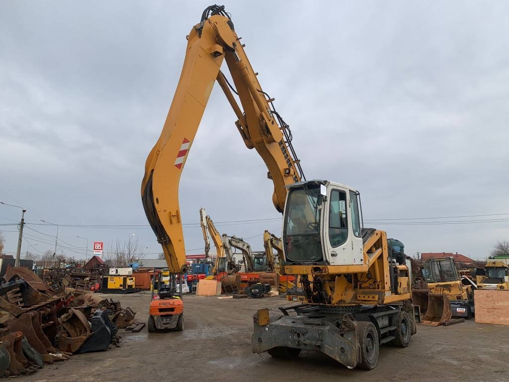 Liebherr A 904 C - Escavadeira de rodas: foto 1 Liebherr A 904 C - Escavadeira de rodas: foto 1