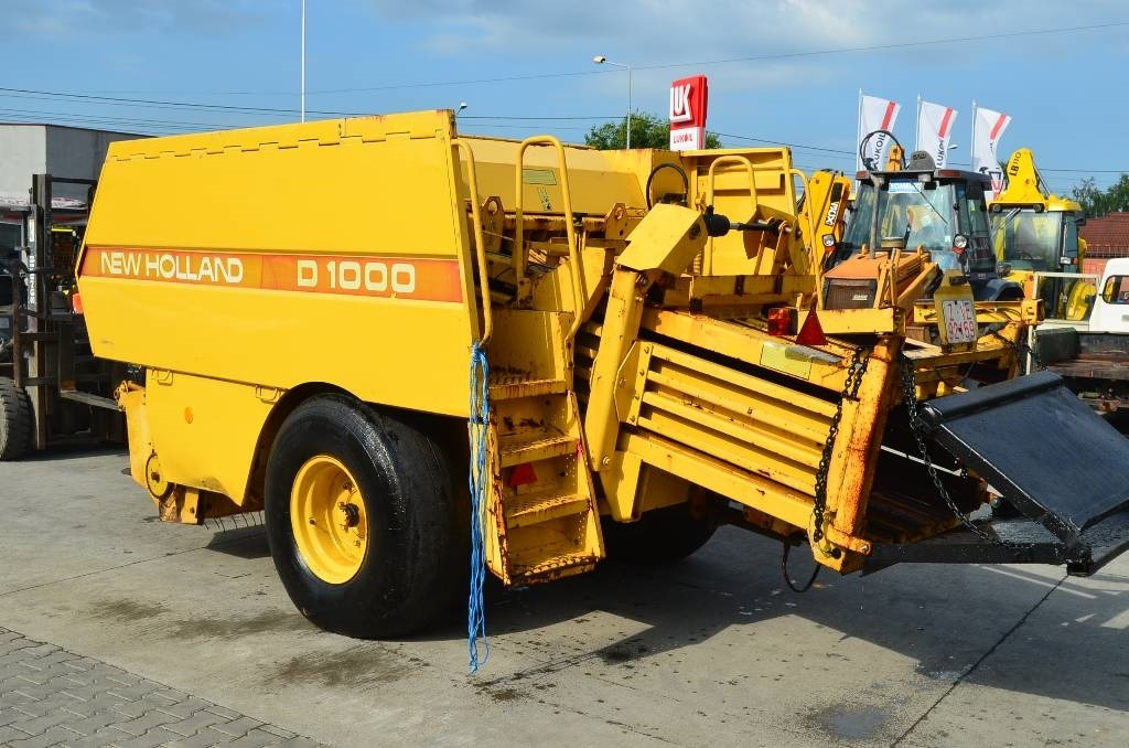 New Holland D1000 - Enfardadeira de fardos quadrados: foto 2 New Holland D1000 - Enfardadeira de fardos quadrados: foto 2