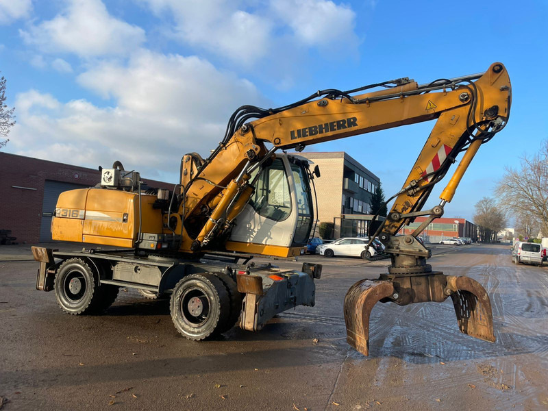 Liebherr A 316 - Escavadeira de rodas: foto 4 Liebherr A 316 - Escavadeira de rodas: foto 4