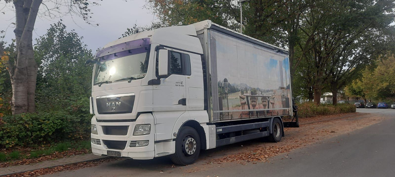 MAN TGX 18.360PS 4x2 G.Haus Kran+Funk - Caminhão com lona, Caminhão grua: foto 1 MAN TGX 18.360PS 4x2 G.Haus Kran+Funk - Caminhão com lona, Caminhão grua: foto 1