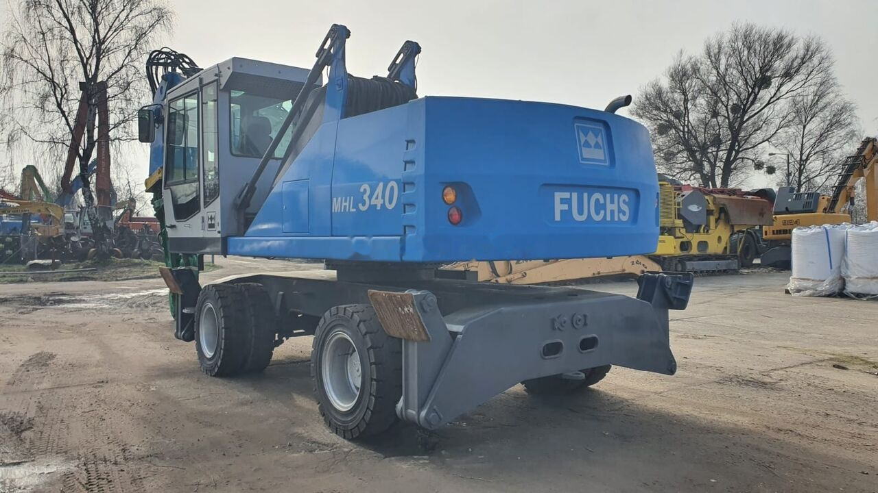 Manipulador de material Fuchs MHL 340D FQC + LST 3to shear: foto 9
