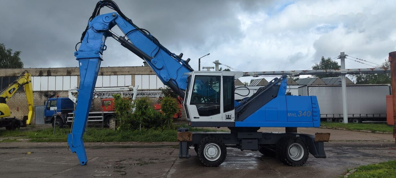 Manipulador de material Fuchs MHL 340D FQC + LST 3to shear: foto 20