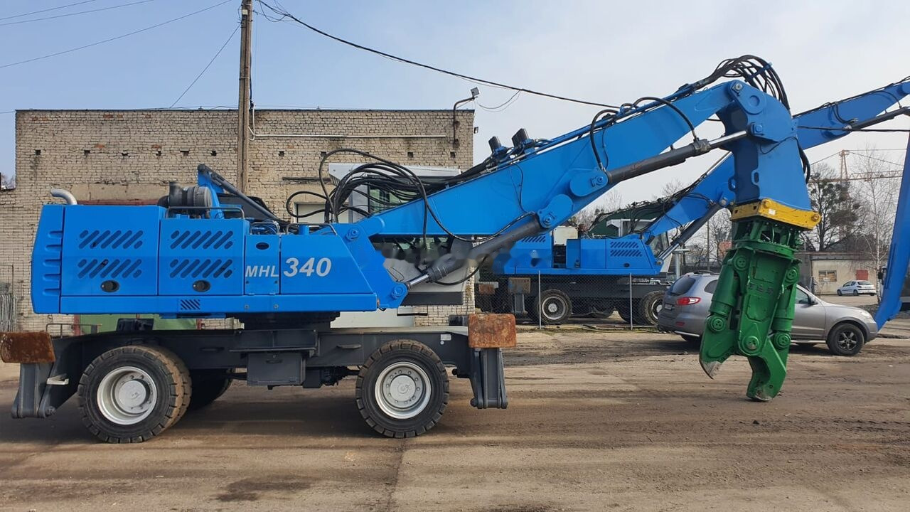 Manipulador de material Fuchs MHL 340D FQC + LST 3to shear: foto 6