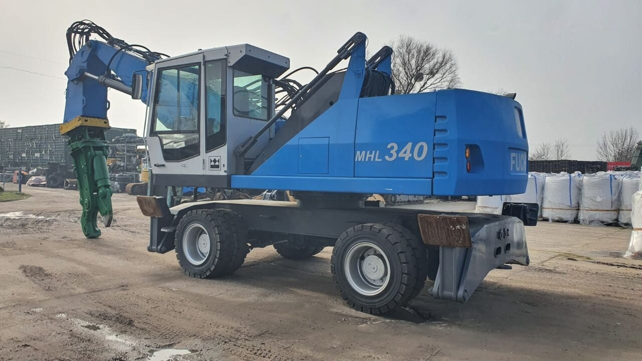 Manipulador de material Fuchs MHL 340D FQC + LST 3to shear: foto 10