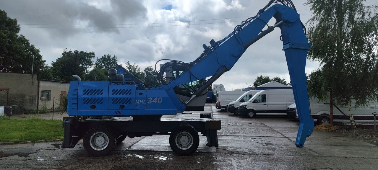 Manipulador de material Fuchs MHL 340D FQC + LST 3to shear: foto 21