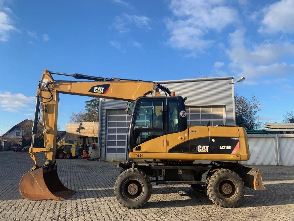 CAT M 316 D - Escavadeira de rodas: foto 2 CAT M 316 D - Escavadeira de rodas: foto 2