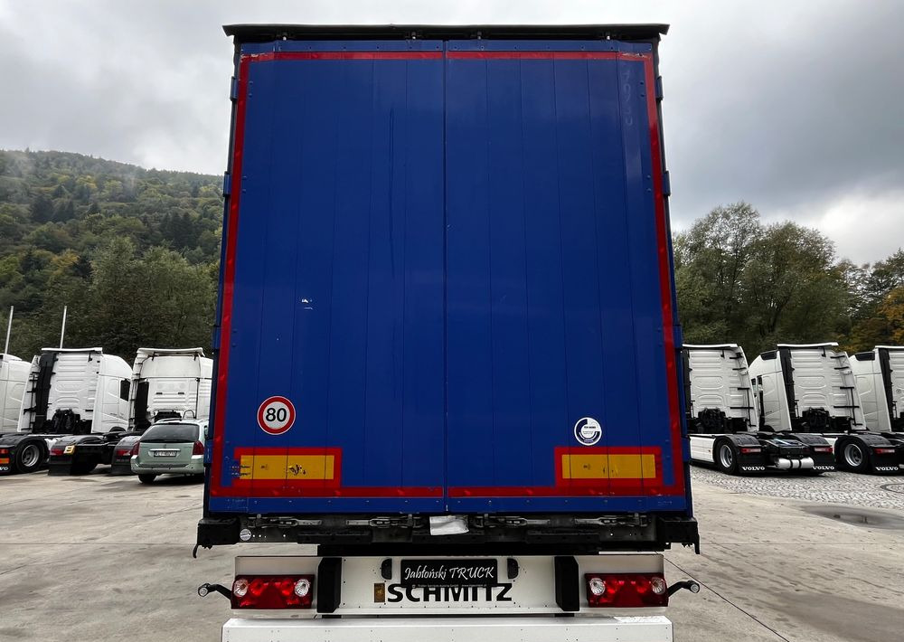 Schmitz Cargobull Firanka Standard Coilmulde // 9m // Oś podnoszona // Osie Schmitz // - Semi-reboque de lona: foto 2 Schmitz Cargobull Firanka Standard Coilmulde // 9m // Oś podnoszona // Osie Schmitz // - Semi-reboque de lona: foto 2