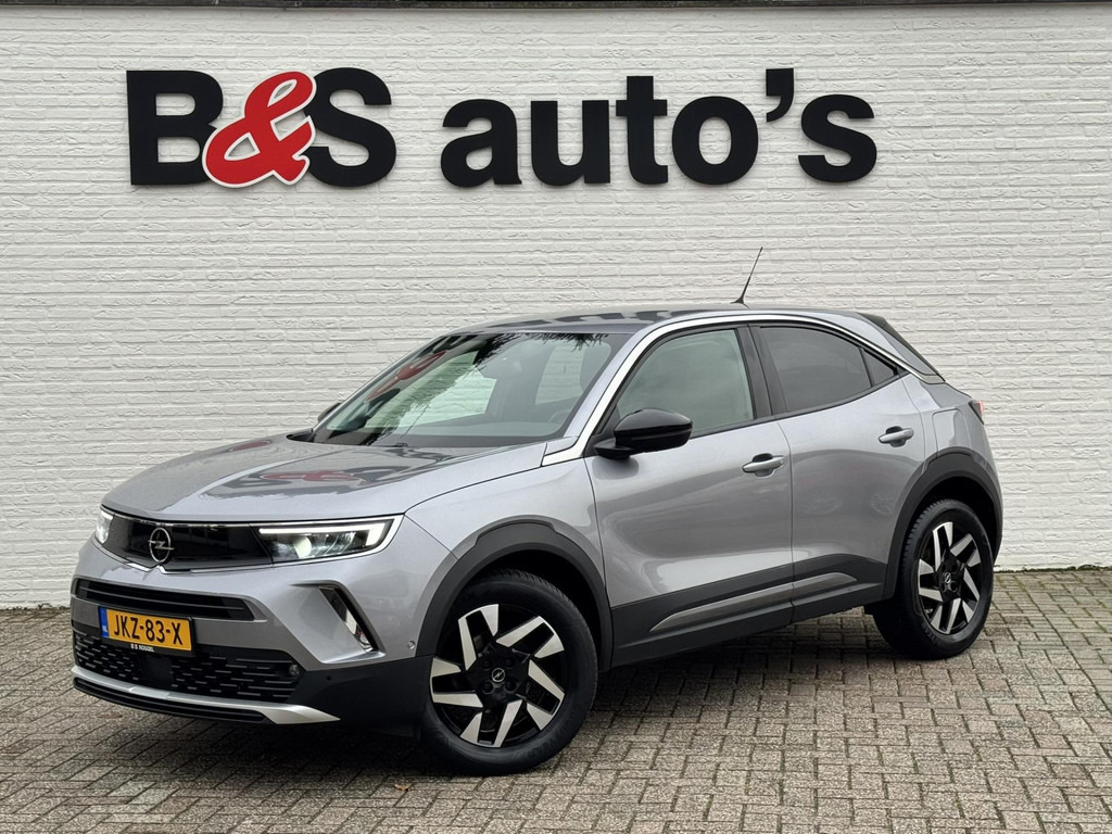 Opel Mokka-1.2 Turbo Elegance Cruise control Climate control Stoel- stuurverwarming Apple / Android Parkeersensoren plus camera - SUV: foto 1 Opel Mokka-1.2 Turbo Elegance Cruise control Climate control Stoel- stuurverwarming Apple / Android Parkeersensoren plus camera - SUV: foto 1