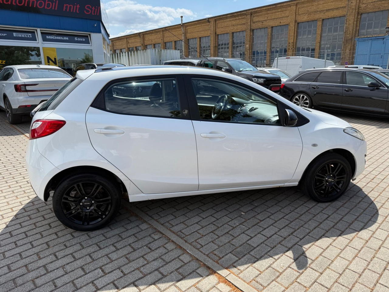 Mazda 2 Lim. 1.3 Origami 5 TÜER KLIMA SHZ TÜV NEU - Automóvel: foto 3 Mazda 2 Lim. 1.3 Origami 5 TÜER KLIMA SHZ TÜV NEU - Automóvel: foto 3