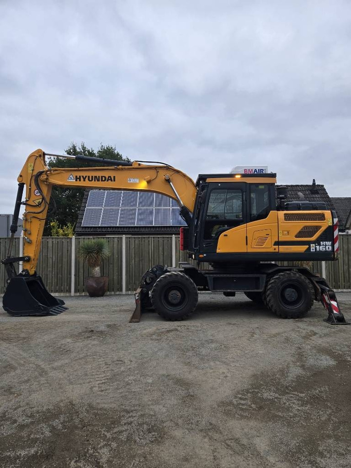 Hyundai HW 160 - Escavadeira de rodas: foto 1 Hyundai HW 160 - Escavadeira de rodas: foto 1