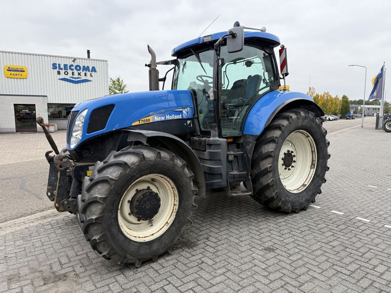 New Holland T7050 Power Command - Trator: foto 1 New Holland T7050 Power Command - Trator: foto 1