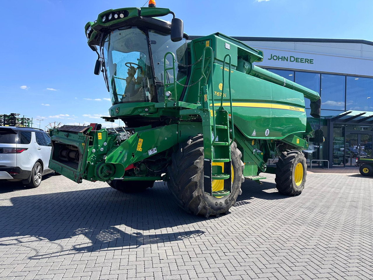 John Deere T670i HM - Ceifeira debulhadora: foto 1 John Deere T670i HM - Ceifeira debulhadora: foto 1