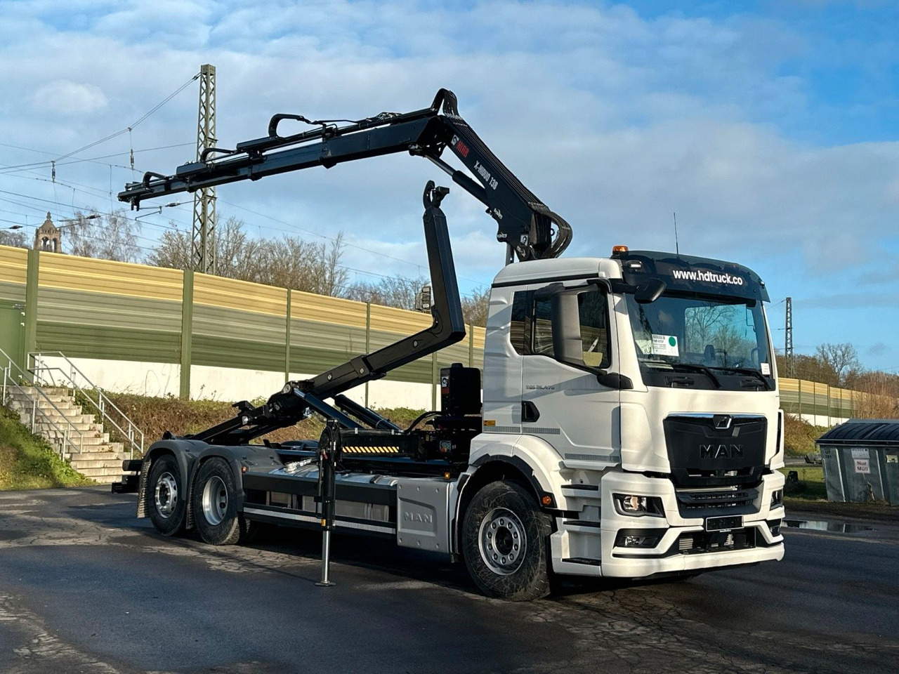 MAN TGS 26.470 6x2 Abrollkipper + Kran Hiab 138-3 - Caminhão polibenne, Caminhão grua: foto 1 MAN TGS 26.470 6x2 Abrollkipper + Kran Hiab 138-3 - Caminhão polibenne, Caminhão grua: foto 1