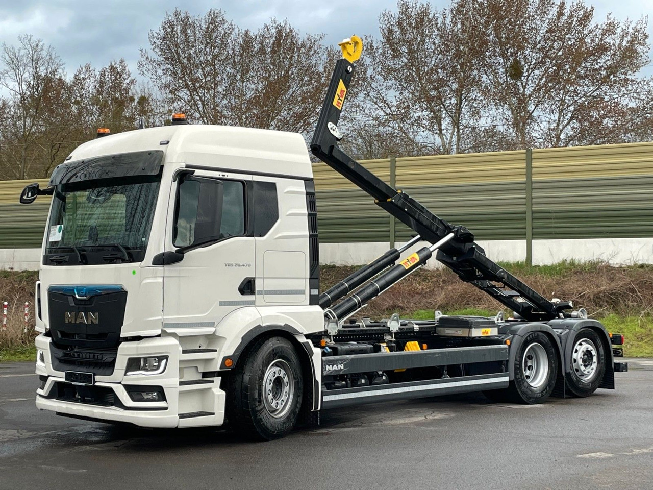 MAN TGS 26.480 6x2 Retarder Hyva 20-60 Abrollkipper - Caminhão polibenne: foto 1 MAN TGS 26.480 6x2 Retarder Hyva 20-60 Abrollkipper - Caminhão polibenne: foto 1