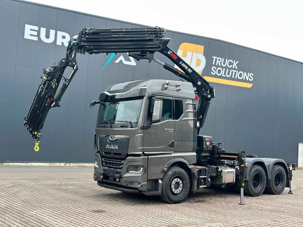 MAN TGX 26.580 6x4 Kran Hiab 302-6 + Jib-4 - Caminhão grua: foto 1 MAN TGX 26.580 6x4 Kran Hiab 302-6 + Jib-4 - Caminhão grua: foto 1