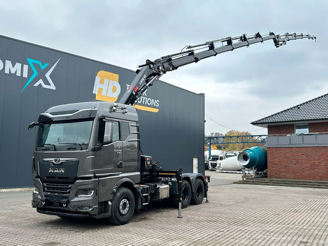 MAN TGX 26.580 6x4 Kran Hiab 302-6 + Jib-4 - Caminhão grua: foto 2 MAN TGX 26.580 6x4 Kran Hiab 302-6 + Jib-4 - Caminhão grua: foto 2