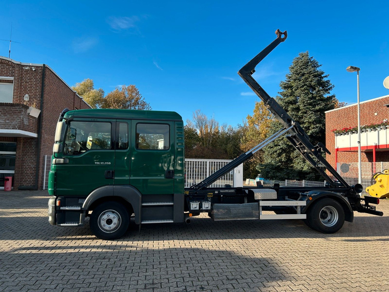 MAN 12.250 Doppelkabine Abroller - Caminhão polibenne: foto 5 MAN 12.250 Doppelkabine Abroller - Caminhão polibenne: foto 5