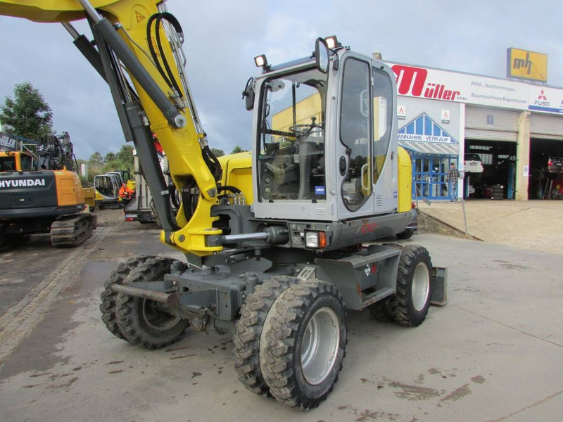WACKER NEUSON EW 100 Mobilbagger Klima / AC / 59.500 EUR - Escavadeira de rodas: foto 2 WACKER NEUSON EW 100 Mobilbagger Klima / AC / 59.500 EUR - Escavadeira de rodas: foto 2