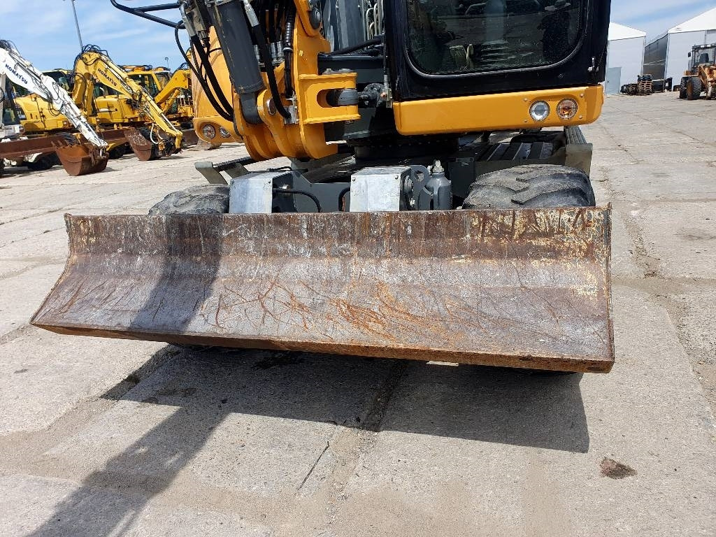 Escavadeira de rodas Liebherr A 910 Compact: foto 11