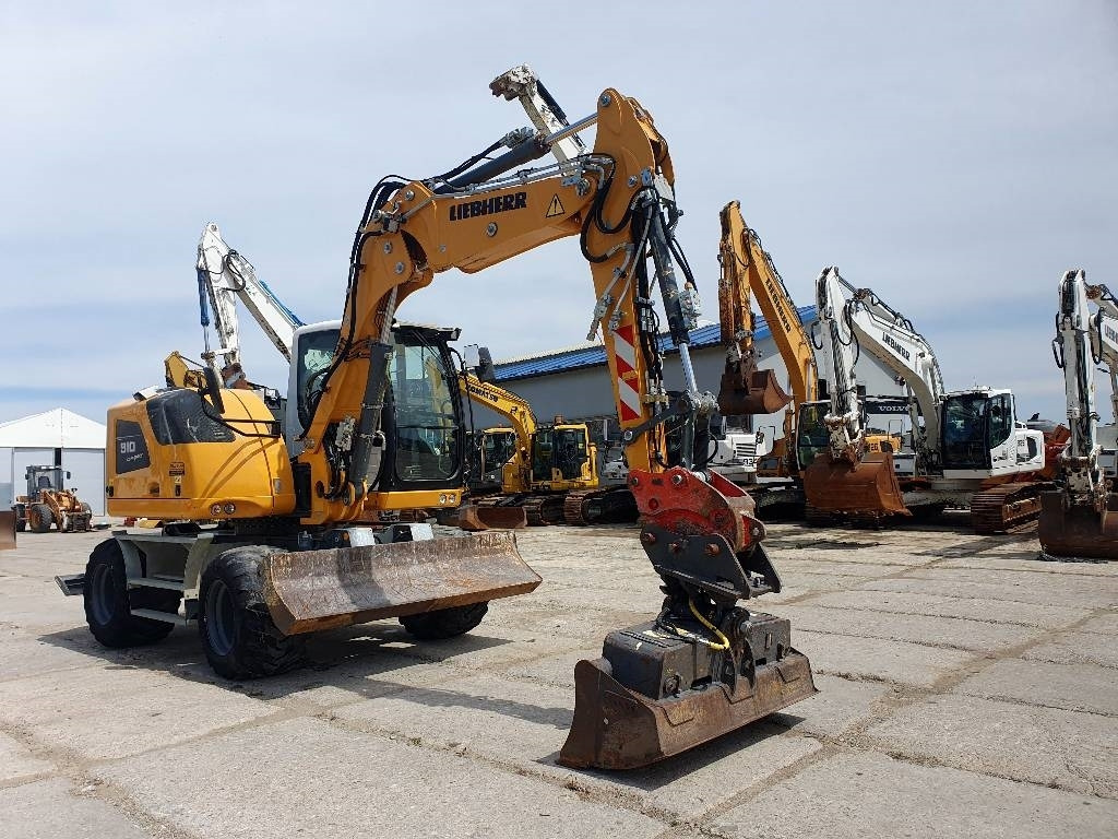 Escavadeira de rodas Liebherr A 910 Compact: foto 6