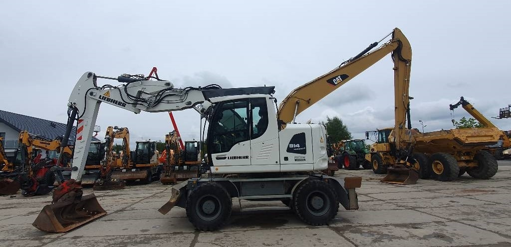 Liebherr A 914 Compact - Escavadeira de rodas: foto 2 Liebherr A 914 Compact - Escavadeira de rodas: foto 2