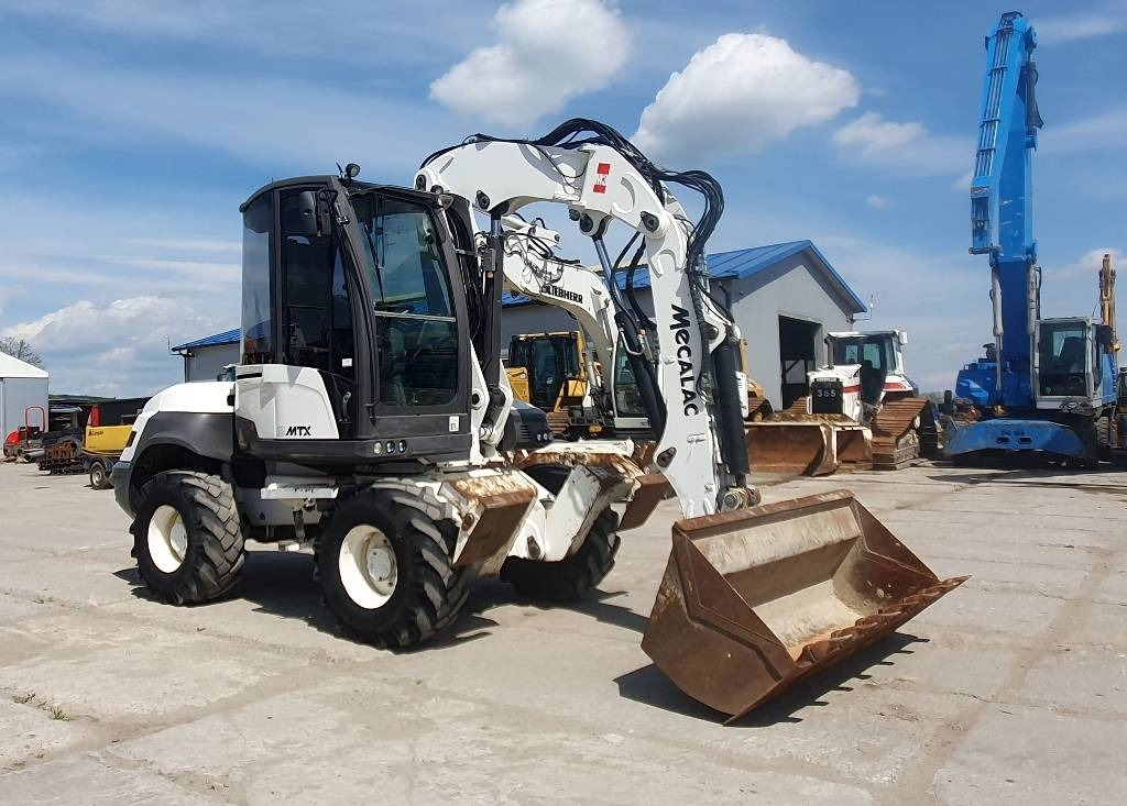 Mecalac 12 M TX - Escavadeira de rodas: foto 5 Mecalac 12 M TX - Escavadeira de rodas: foto 5