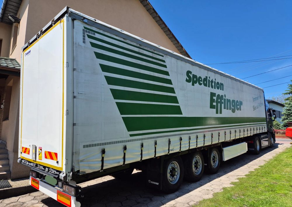 Krone BURTOWA BUDOWLANA VARIOS PÓŁMEGA 385/55 z Niemiec / ALUFELGI / stan bardzo dobry / PODNOSZONA OŚ I DACH / BPW firanka burto-firanka firana burtówka burto firanka - Semi-reboque de lona: foto 1 Krone BURTOWA BUDOWLANA VARIOS PÓŁMEGA 385/55 z Niemiec / ALUFELGI / stan bardzo dobry / PODNOSZONA OŚ I DACH / BPW firanka burto-firanka firana burtówka burto firanka - Semi-reboque de lona: foto 1