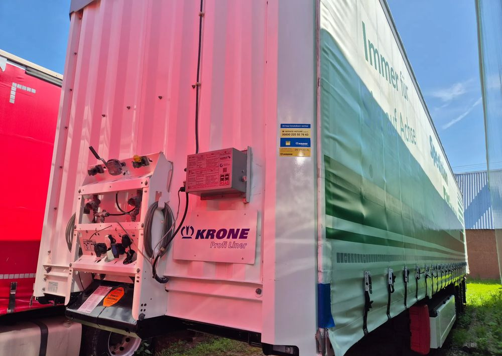 Krone BURTOWA BUDOWLANA VARIOS PÓŁMEGA 385/55 z Niemiec / ALUFELGI / stan bardzo dobry / PODNOSZONA OŚ I DACH / BPW firanka burto-firanka firana burtówka burto firanka - Semi-reboque de lona: foto 5 Krone BURTOWA BUDOWLANA VARIOS PÓŁMEGA 385/55 z Niemiec / ALUFELGI / stan bardzo dobry / PODNOSZONA OŚ I DACH / BPW firanka burto-firanka firana burtówka burto firanka - Semi-reboque de lona: foto 5