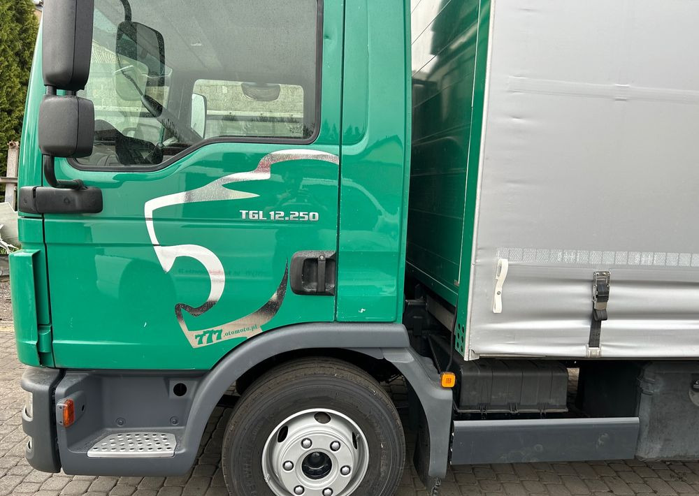 MAN TGL 12.250 6.2m AUTOMAT KLIMA z Niemiec ESP nowe opony EURO 6 / 4.75 rozstaw / zawiesie na wózek widłowy / TOP STAN / okazja nauka jazdy MOŻLIWOŚĆ DOSTOSOWANIA 12t - Caminhão com lona: foto 5 MAN TGL 12.250 6.2m AUTOMAT KLIMA z Niemiec ESP nowe opony EURO 6 / 4.75 rozstaw / zawiesie na wózek widłowy / TOP STAN / okazja nauka jazdy MOŻLIWOŚĆ DOSTOSOWANIA 12t - Caminhão com lona: foto 5