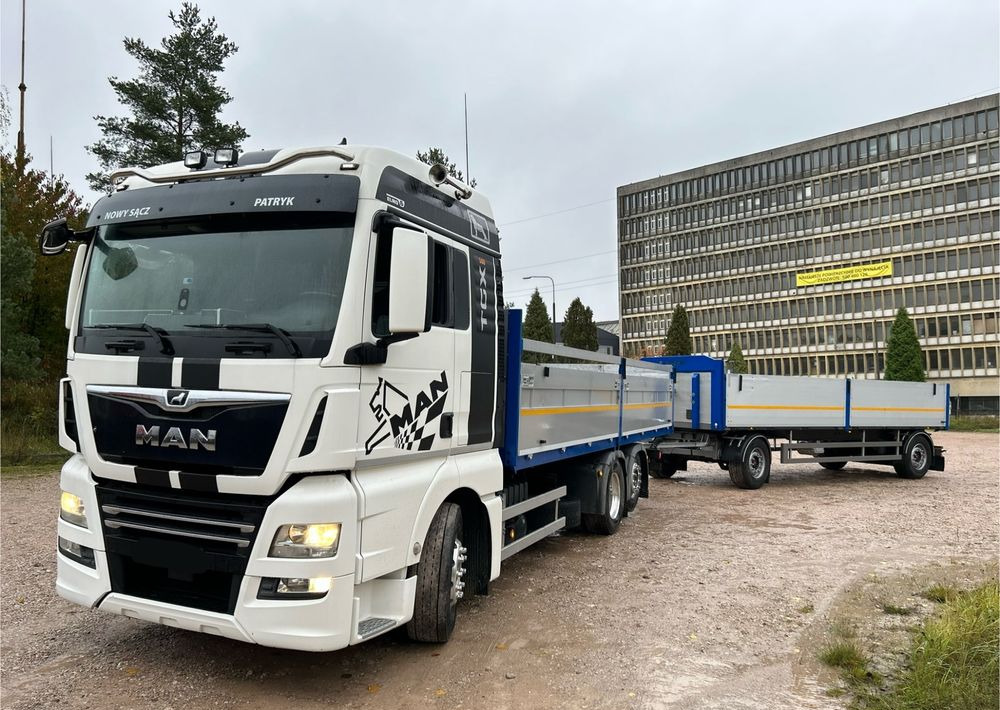 MAN TGX Tandem 1m burty TOP KOMPLET / ALUFELGI / zarejestrowany gotowy do pracy / przyczepa 18t / FULL OPCJA / 26.420 26.460 26.500 26.400 26.440 26.480 26.510 460 500 - Camião de caixa aberta/ Plataforma: foto 1 MAN TGX Tandem 1m burty TOP KOMPLET / ALUFELGI / zarejestrowany gotowy do pracy / przyczepa 18t / FULL OPCJA / 26.420 26.460 26.500 26.400 26.440 26.480 26.510 460 500 - Camião de caixa aberta/ Plataforma: foto 1