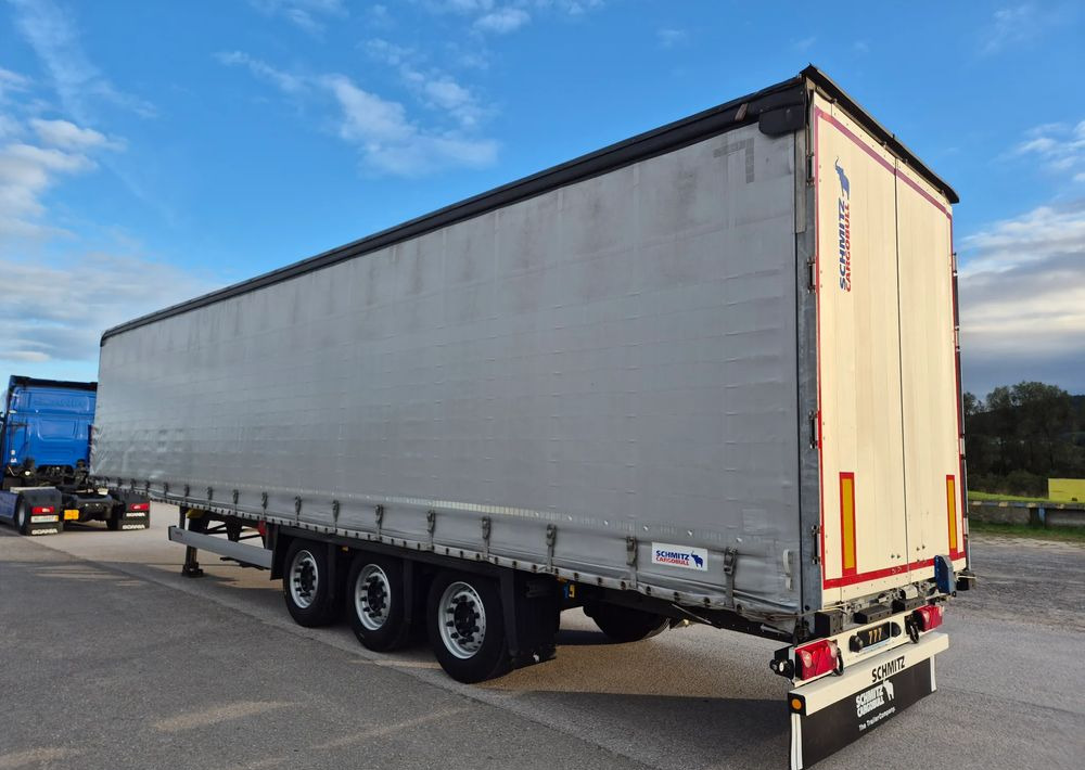 Schmitz Cargobull Varios 2021 podnoszony dach / poziomy jazdy dachu /  od pierwszego właściciela / OKAZJA - Semi-reboque de lona: foto 1 Schmitz Cargobull Varios 2021 podnoszony dach / poziomy jazdy dachu /  od pierwszego właściciela / OKAZJA - Semi-reboque de lona: foto 1