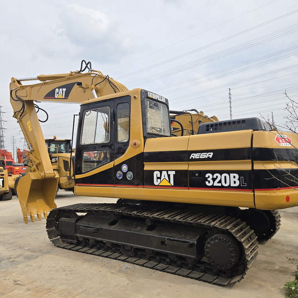 CATERPILLAR 320BL - Escavadora de rastos: foto 1 CATERPILLAR 320BL - Escavadora de rastos: foto 1