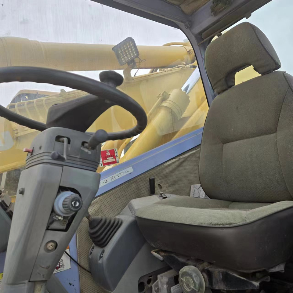 KOMATSU PC128US - Escavadeira de rodas: foto 5 KOMATSU PC128US - Escavadeira de rodas: foto 5