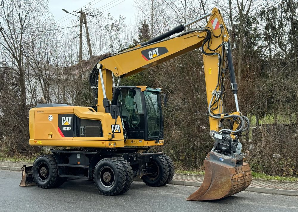 Caterpillar CAT 318 F * Powertilt * Sprowadzony* 9700 MTG * Caterpillar * Stan Perfekcyjny - Escavadeira de rodas: foto 3 Caterpillar CAT 318 F * Powertilt * Sprowadzony* 9700 MTG * Caterpillar * Stan Perfekcyjny - Escavadeira de rodas: foto 3