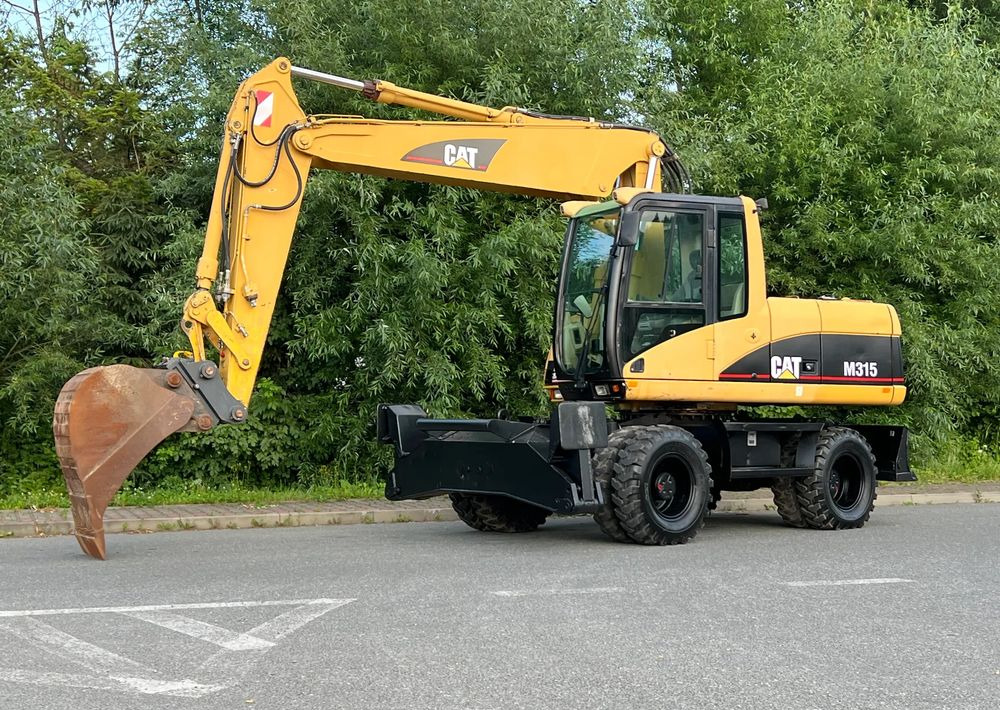 Caterpillar CAT M315C CATERPILLAR SPROWADZONY Bardzo Dobry Stan - Escavadeira de rodas: foto 1 Caterpillar CAT M315C CATERPILLAR SPROWADZONY Bardzo Dobry Stan - Escavadeira de rodas: foto 1