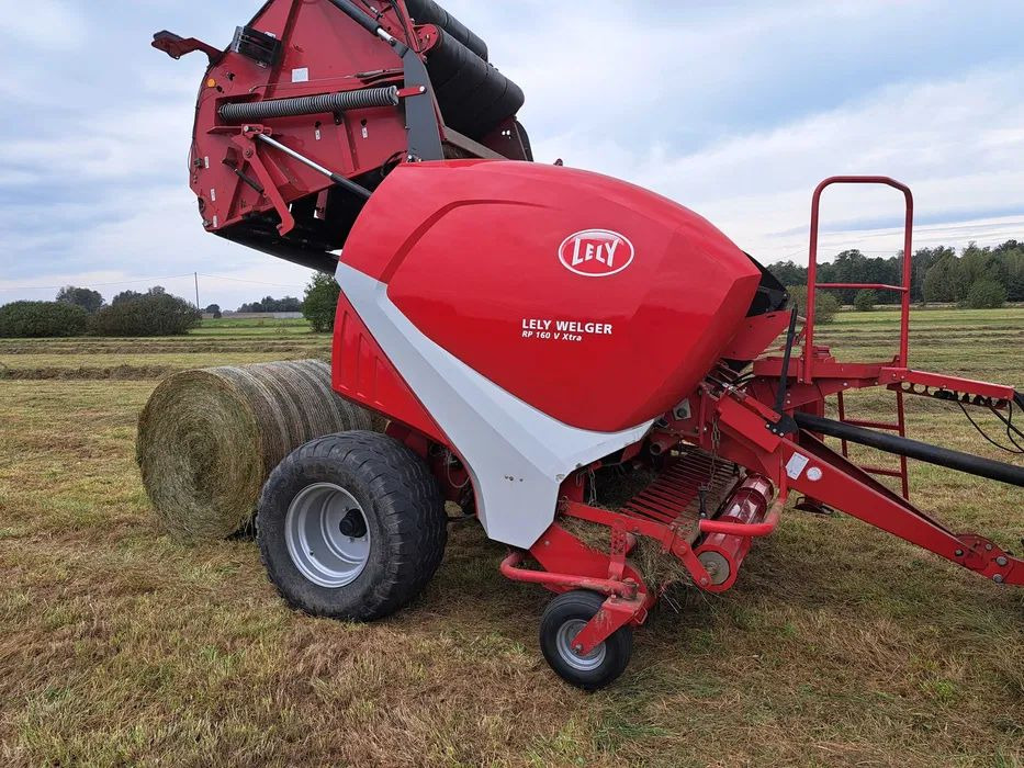 Prasa rolująca Lely V 160 Welger 445 - Enfardadeira de fardos redondos: foto 1 Prasa rolująca Lely V 160 Welger 445 - Enfardadeira de fardos redondos: foto 1