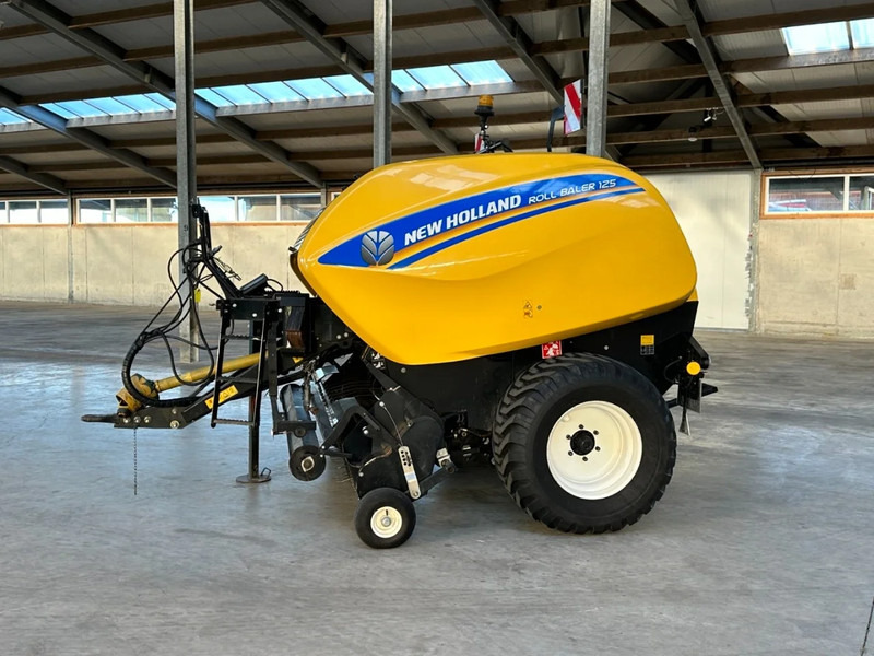 New Holland Roll baler 125 - Colheitadeira: foto 2 New Holland Roll baler 125 - Colheitadeira: foto 2