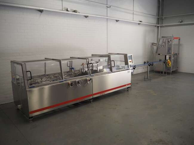 Schut Systems carton line EM60 - Máquina de embalagem: foto 1 Schut Systems carton line EM60 - Máquina de embalagem: foto 1