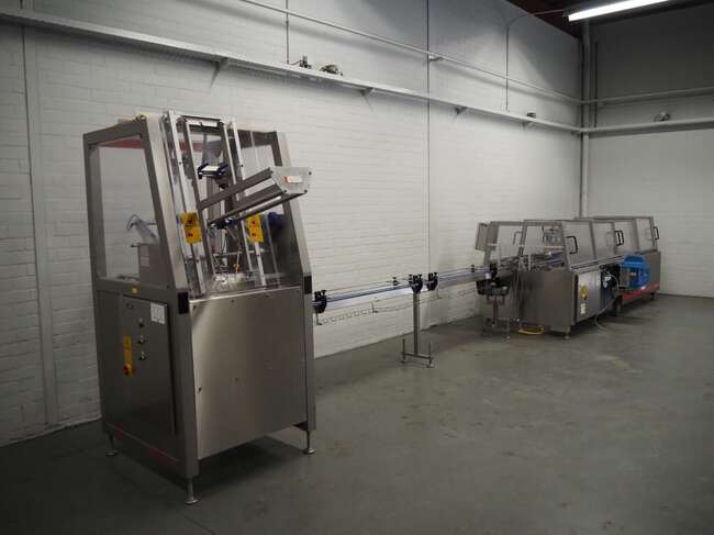 Schut Systems carton line EM60 - Máquina de embalagem: foto 3 Schut Systems carton line EM60 - Máquina de embalagem: foto 3