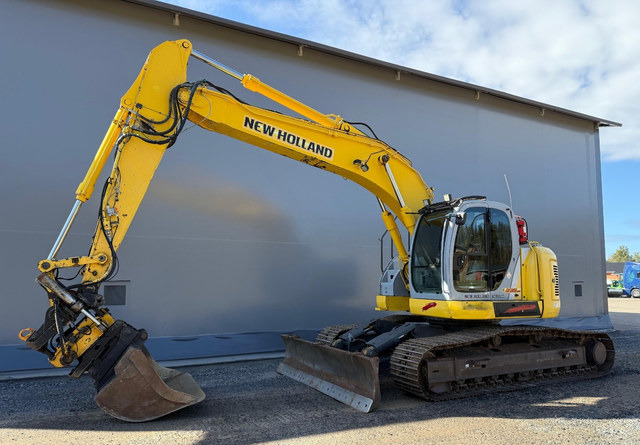 New HollandE235SR - Escavadora de rastos: foto 1 New HollandE235SR - Escavadora de rastos: foto 1